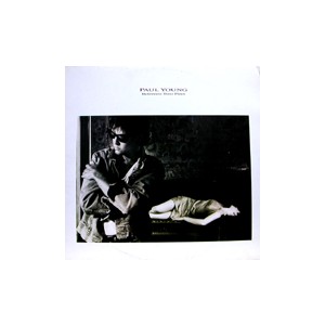 Paul Young /  BETWEEN TWO FIRES